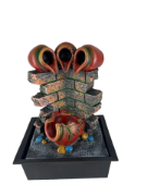 Снимка на Фонтан с три делви и стена