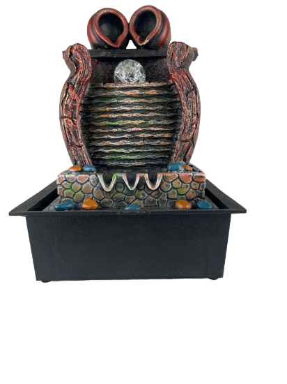 Снимка на Фонтан с топче и стена